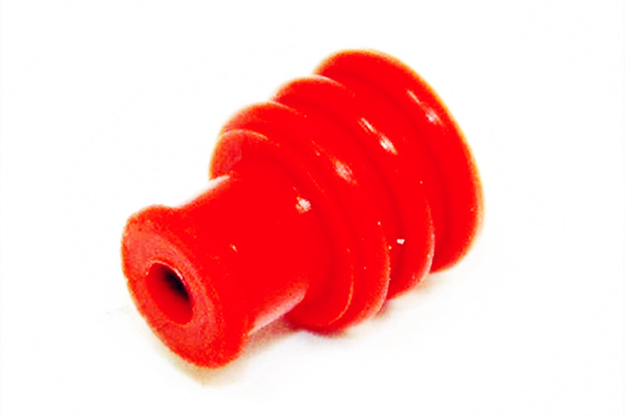 Sellos de goma de silicona rojos para proteger el cableado.