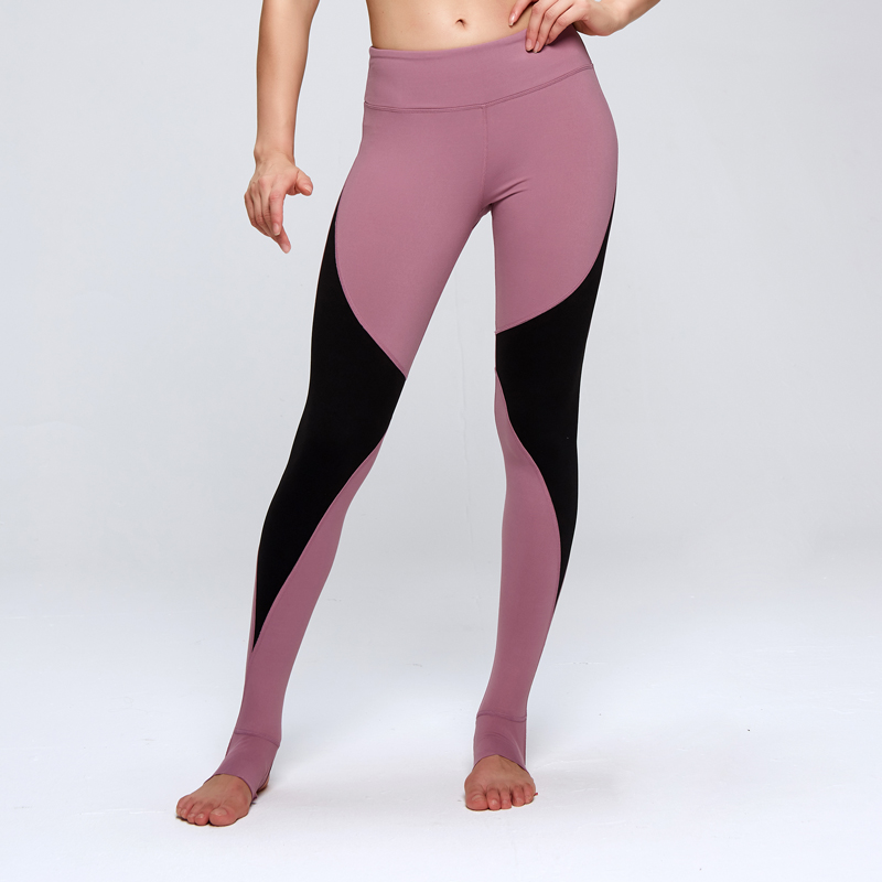 Pantalones de yoga de compresión suave y cómodos con diseño sobre el talón y control de barriga