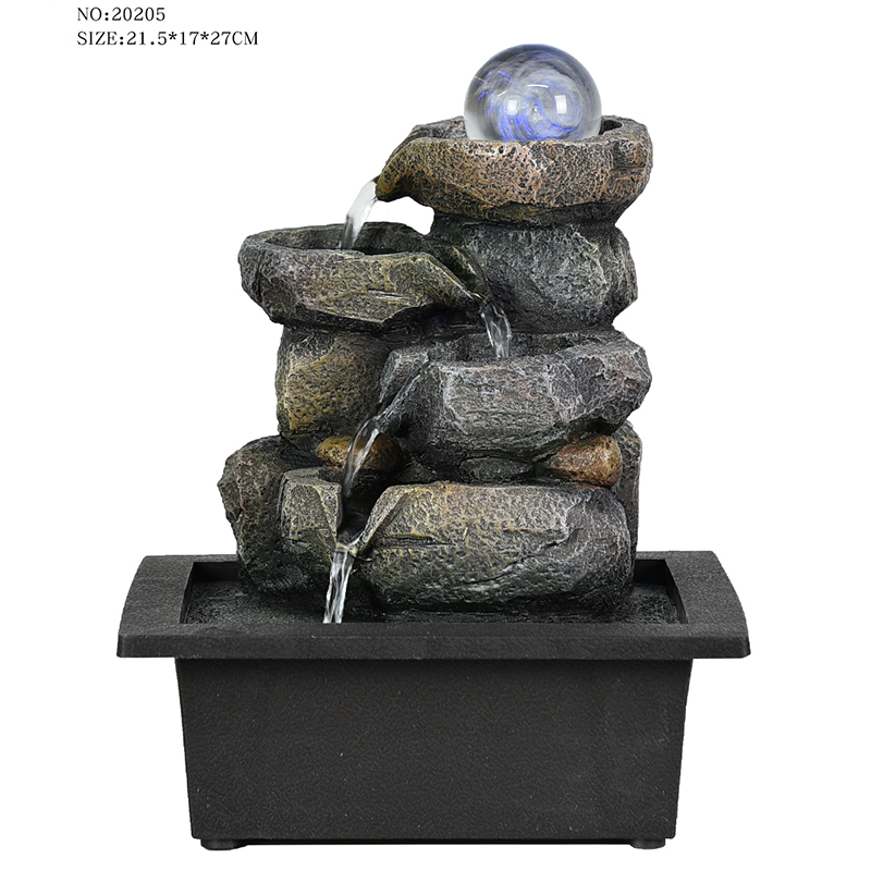 Bonita fuente de agua de mesa de resina estilo piedra real para decoración del hogar con bola rodante de vidrio de colores a la venta